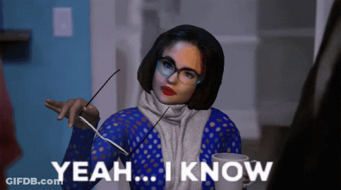 Woman With Glasses And Scarf Holding Cup Saying Yeah I Know GIF