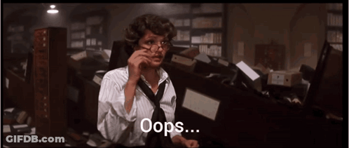 Woman With Glasses And Tie On Phone Oops GIF
