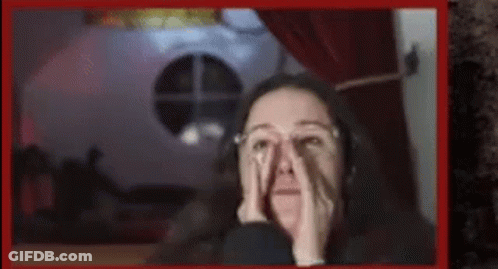 Woman With Glasses Covering Face GIF