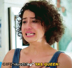 Woman With Glasses Holding Colorful Object Screaming Yaaaaaaaas GIF