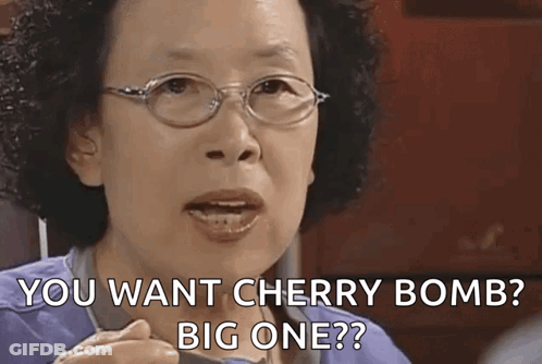 Woman With Glasses Holding Spoon You Want Cherry Bomb Big One GIF