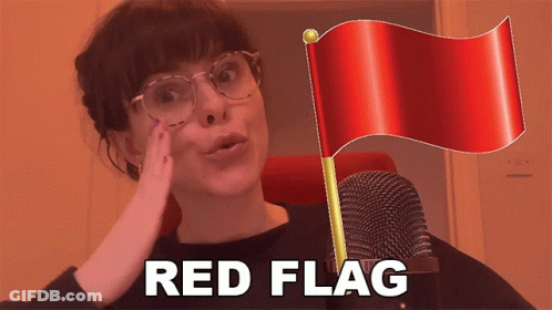Woman With Glasses Holds Red Flag And Microphone Saying Red Flag GIF