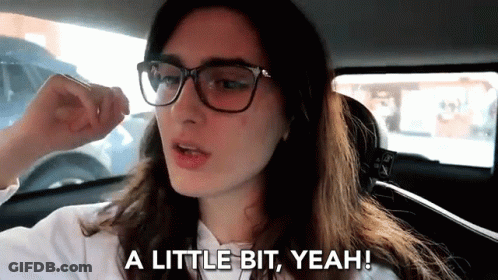 Woman With Glasses In Car Saying A Little Bit Yeah GIF