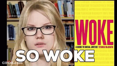 Woman With Glasses In Front Of Book Called Woke GIF