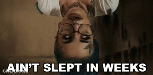 Woman With Glasses Laying Upside Down GIF