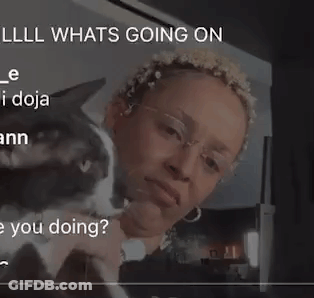 Woman With Glasses Looking At Camera E_i Doja Ann GIF