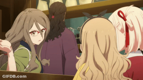 Woman With Glasses Looking In Mirror GIF