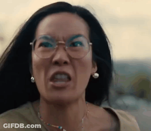 Woman With Glasses Making Angry Face GIF