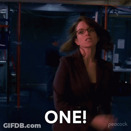 Woman With Glasses Making Funny Face GIF