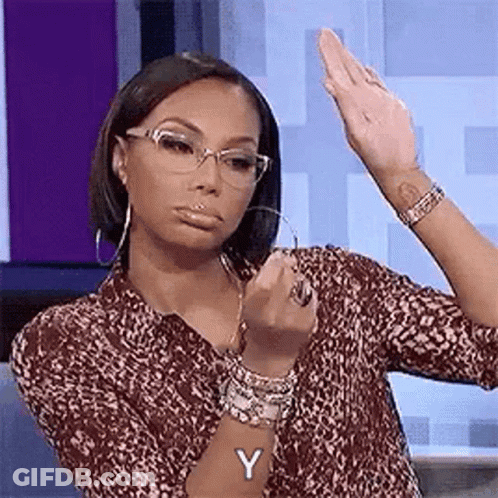 Woman With Glasses Making Funny Face And Middle Finger GIF