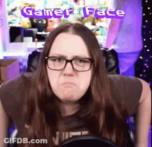 Woman With Glasses Making Funny Face In Front Of Gamer Face Banner GIF