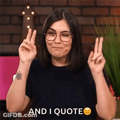 Woman With Glasses Making Peace Sign Saying And I Quote GIF
