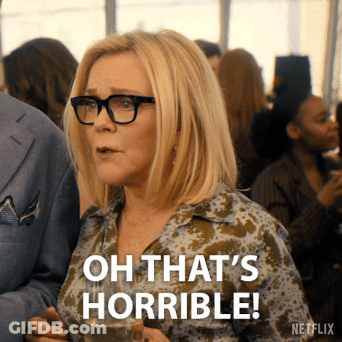 Woman With Glasses Oh That's Horrible Holding Drink GIF