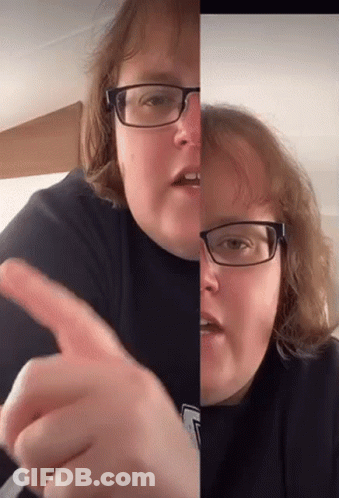 Woman With Glasses Pointing Finger GIF