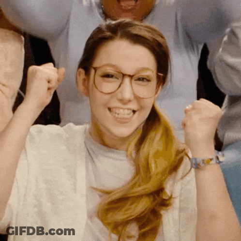 Woman With Glasses Raising Fist GIF