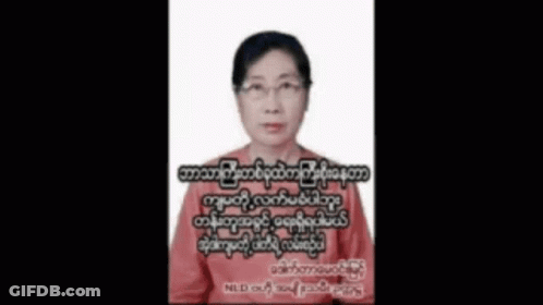 Woman With Glasses Red Shirt Foreign Writing On Face GIF