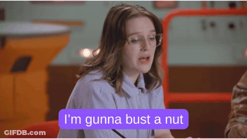 Woman With Glasses Saying Gunna Bust A Nut In Purple Box GIF