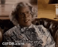 Woman With Glasses Saying Hell To The Yeah GIF