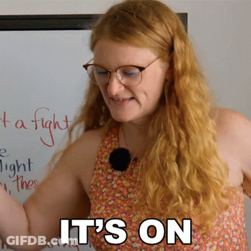 Woman With Glasses Saying It's On GIF