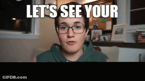 Woman With Glasses Saying Lets See Your Budget GIF