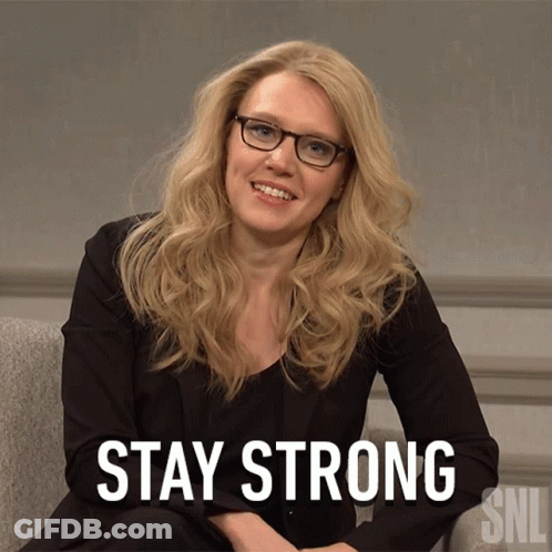 Woman With Glasses Sitting In Chair Stay Strong GIF