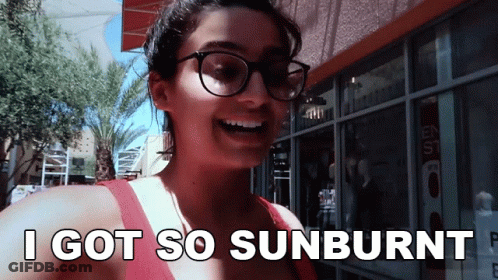 Woman With Glasses Smiling And Saying Sunburnt GIF