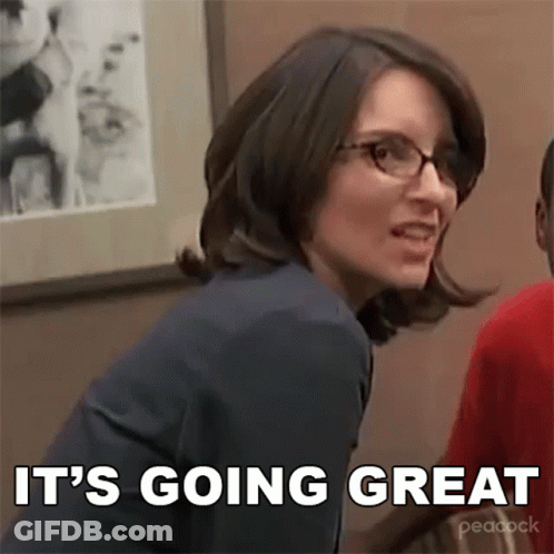 Woman With Glasses Smiling Saying It's Going Great GIF