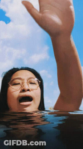 Woman With Glasses Swimming GIF