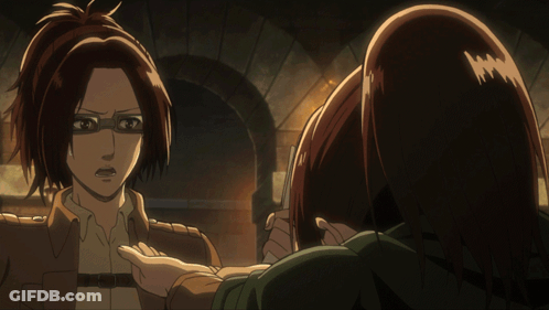 Woman With Glasses Talking To Another Woman In Dark Room GIF