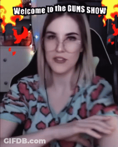 Woman With Glasses Watching Welcome To The Guns Show GIF