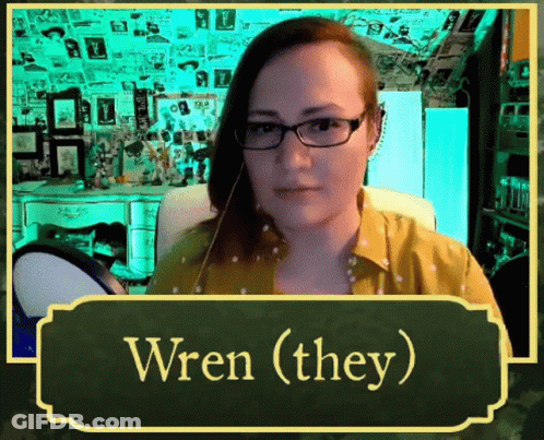 Woman With Glasses Yellow Shirt Says Wren (They) GIF