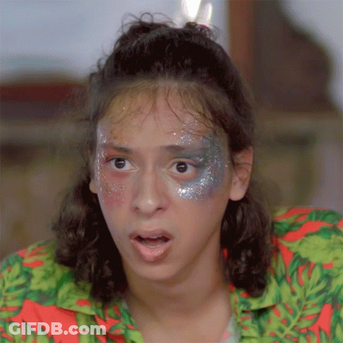 Woman With Glitter Making Funny Face GIF