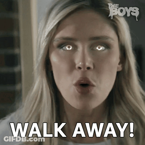 Woman With Glowing Eyes Saying Walk Away GIF