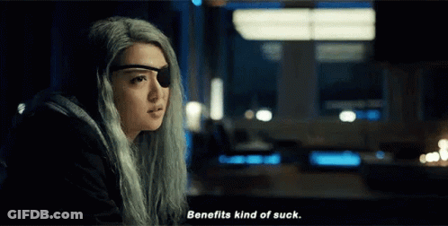 Woman With Gray Hair And Eye Patch Talking GIF