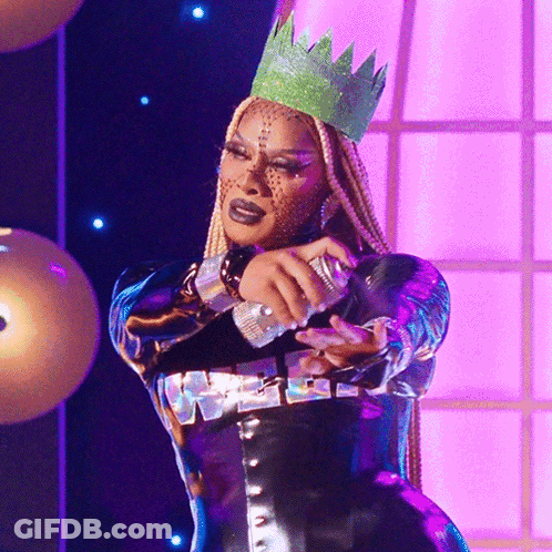 Woman With Green Crown Holding Microphone GIF