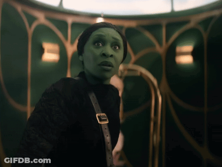 Woman With Green Face And Buckle GIF