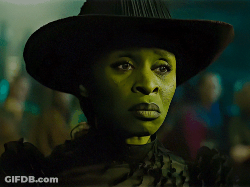 Woman With Green Face And Cowboy Hat GIF