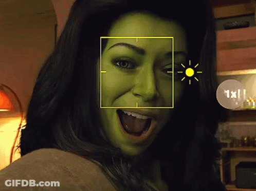 Woman With Green Face Smiling Yellow Square 1X GIF