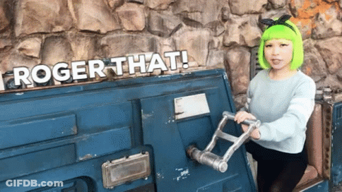Woman With Green Hair And Roger That Sign GIF