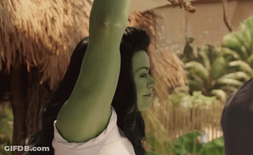 Woman With Green Hair And White Shirt Arm Up GIF