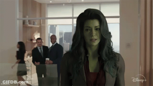 Woman With Green Hair By Window With Disney Logo GIF