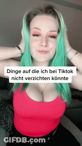 Woman With Green Hair In Red Tank Top Saying Dinge Auf Die Ich Bei Tiktok Nicht Verzichten Könnte GIF
