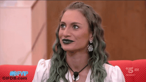 Woman With Green Hair Sitting On Red Couch #Gfvip GIF