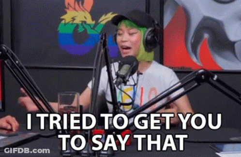Woman With Green Hair Talking Into Microphone GIF