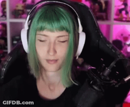 Woman With Green Hair Wearing Headphones And Microphone GIF