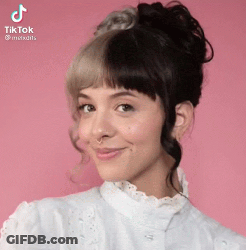 Woman With Half Black Half White Hair Smiling GIF