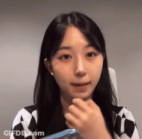 Woman With Hand On Face Close Up GIF