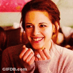 Woman With Hands On Face GIF