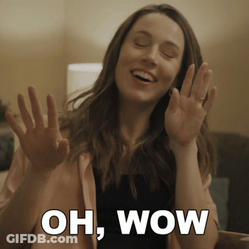 Woman With Hands Up Saying Oh Wow GIF
