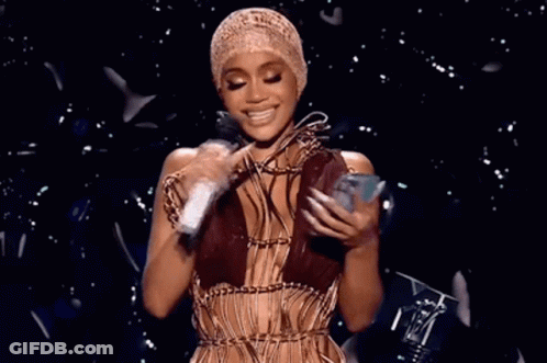 Woman With Hat Holding Microphone And Phone GIF